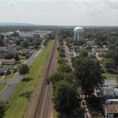 Water Tower Near Railroad